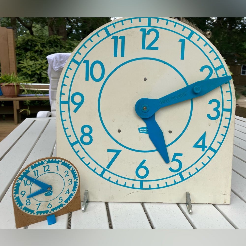 teach Time Judy clock w/metal support legs. Sm individ also. Homeschool items.